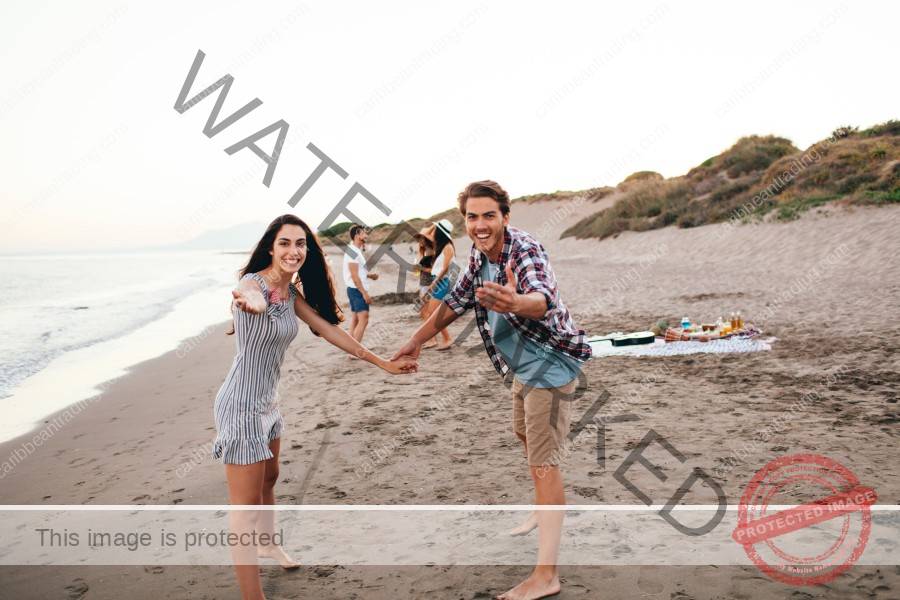young-friends-having-good-time-beach